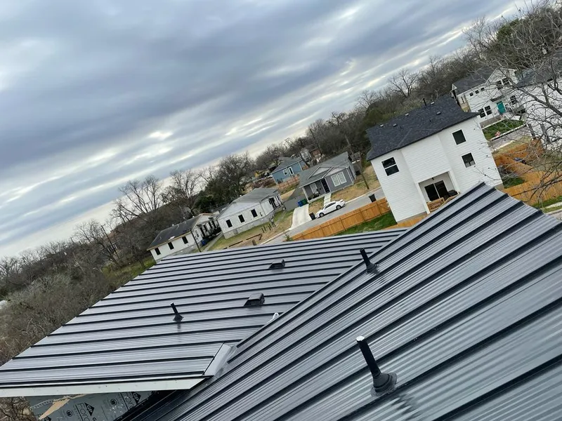 Standing seam metal roof panels with vents for Skylight Repair in Glenpool